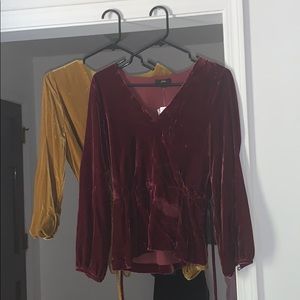 Two V cut velvet formal blouses